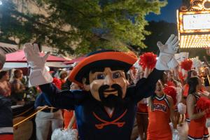 View of UVA mascot Cavman and cheerleaders on the Charlottesville Downtown Mall