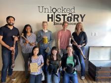 Graduate students, PI, and full time staff at the Unlocked History Escape room