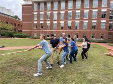 Tug of war competition, lab members pulling the rope